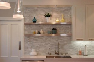 Extraordinary-kitchen-backsplash-design-with-art-wall-decor-along-with-led-lighting-under-the-white-wooden-floating-cabinet-also-simple-steel-stainless-shelves-on-the-wall-beside-door-801x533